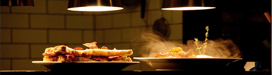 Food under the lights in the Wild Cafe open kitchen
